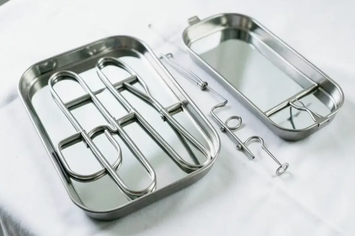 Medical instrument trays and brackets with a mirror-like electropolished surface