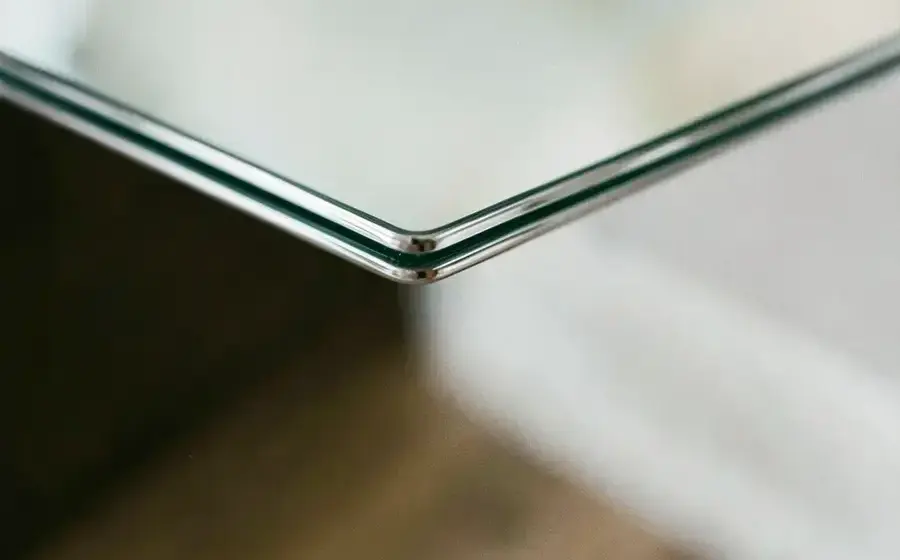 Macro closeup of a mirror polished metal edge with a flawless reflection line